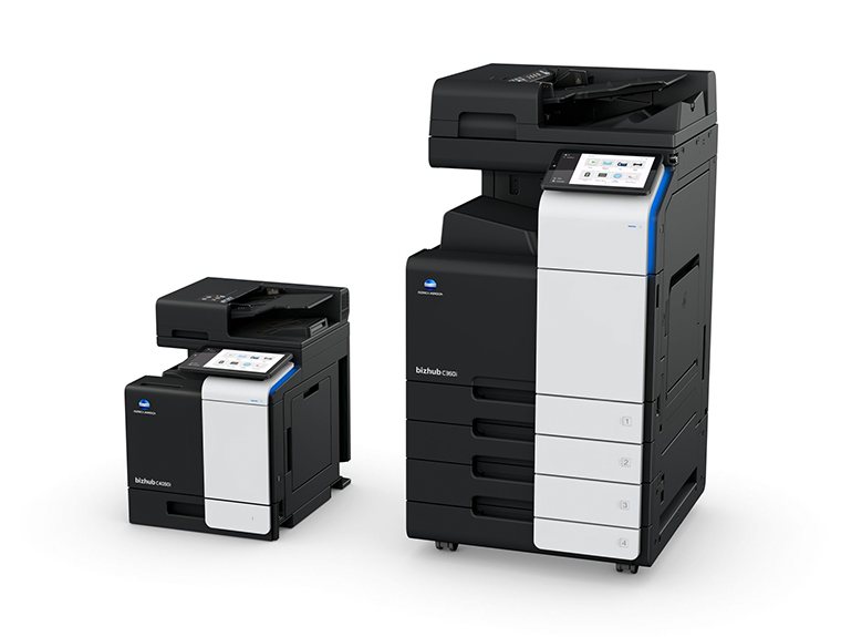 Two Konica Minolta multifunction office printers